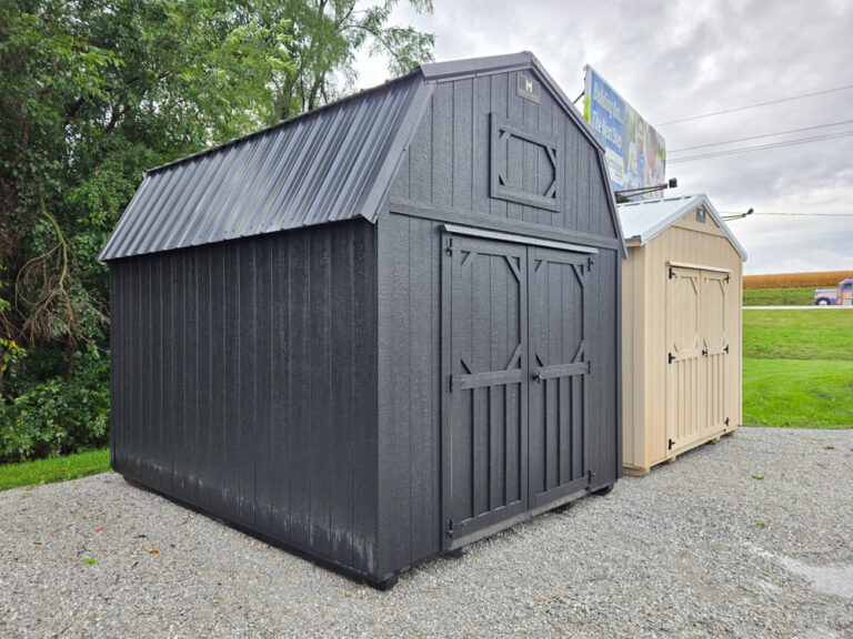 Lofted Barn dark siding with dark trim and metal roof