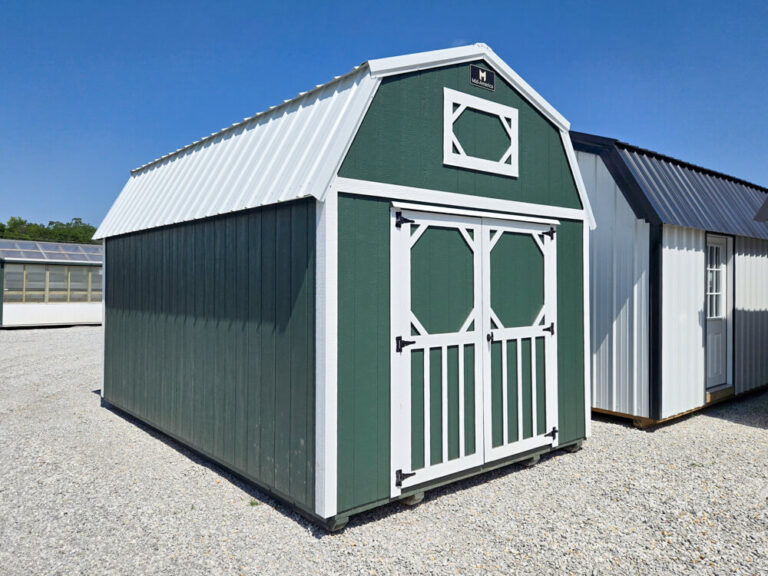 Lofted Barn green siding with white trim and metal roof