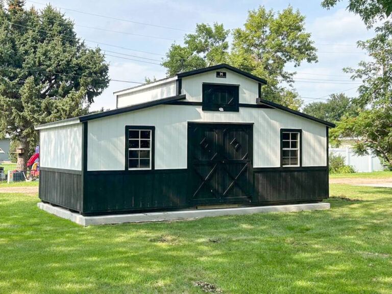 Country Barn white metal siding metal roof and black trim
