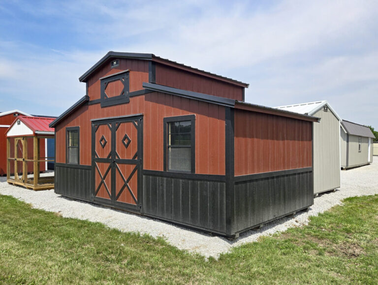 Country Barn with brown metal siding metal roof and dark trim