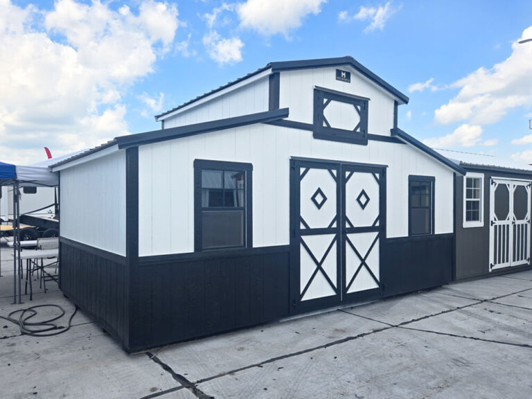 Country Barn with white metal siding metal roof and black trim