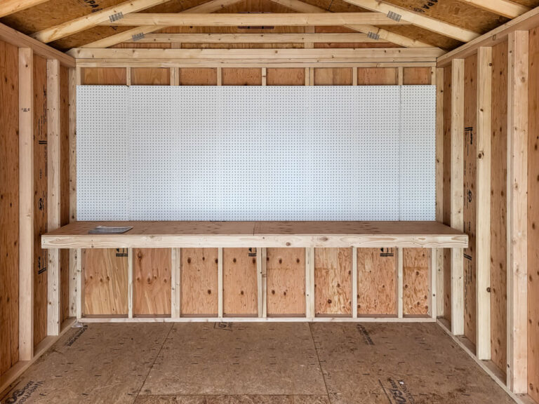 Garage inside view with workbench and pegboard