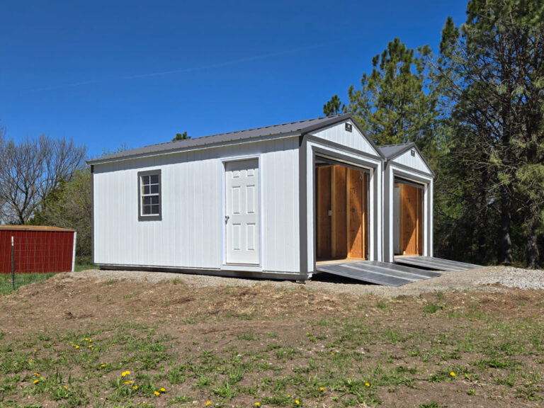 Garage two white single car garages with metal roof