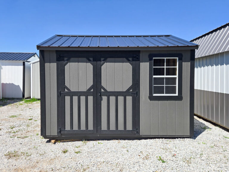 Garden Shed small dark gray siding with black trim and black metal roof