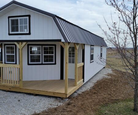 Pre-built Deluxe Cabin finished with black roof and white walls