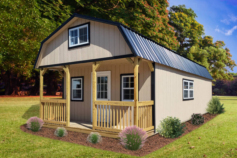 Lofted Cabin Extra Tall tan siding with dark trim and metal roof with porch and wooden railing