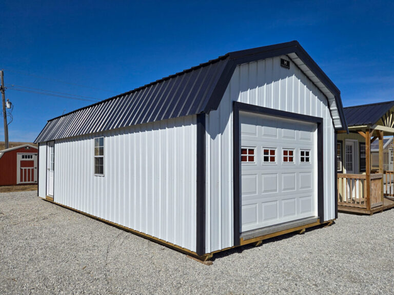 Lofted Garage white metal siding with back metal roof and trim Featured