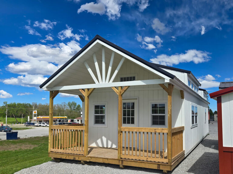 Swiss Cabin white siding trim black metal roof