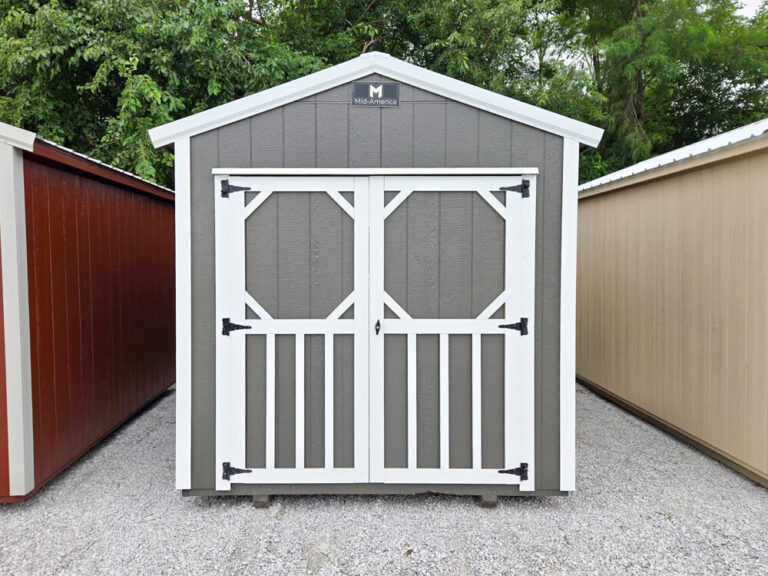 Utility Shed gray siding white trim