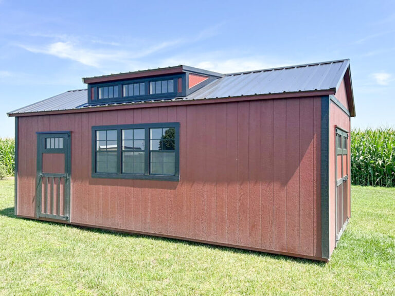 Villa dark brown siding black trim and metal roof