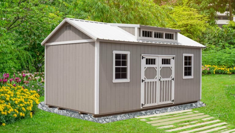 gray Villa with white trim and metal roof with transient windows