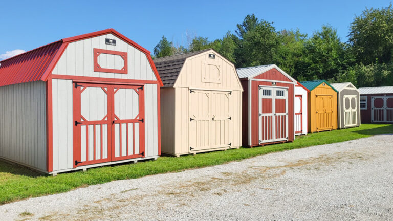 5 mini barns in a row at a sales lot