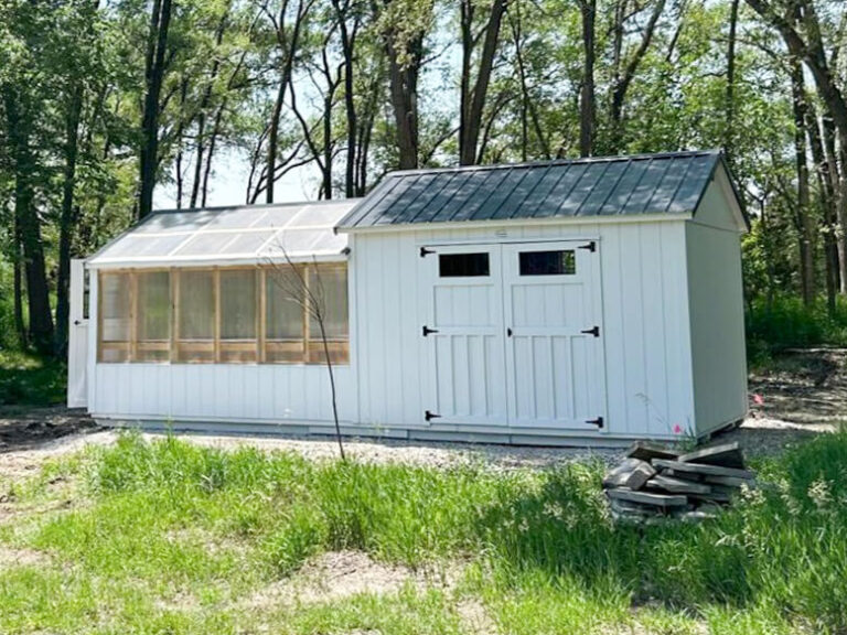 Greenhouse Shed Combo white siding and trim with a metal roof