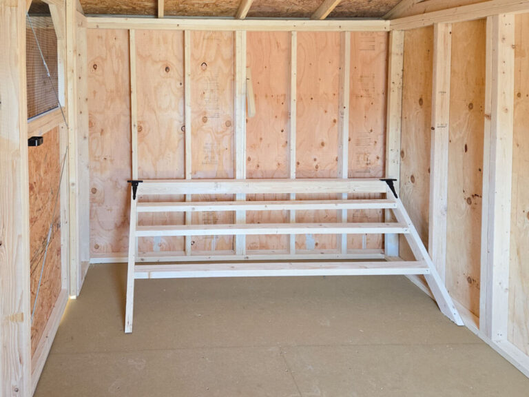 inside chicken coop with roosting perch by midamerica structures
