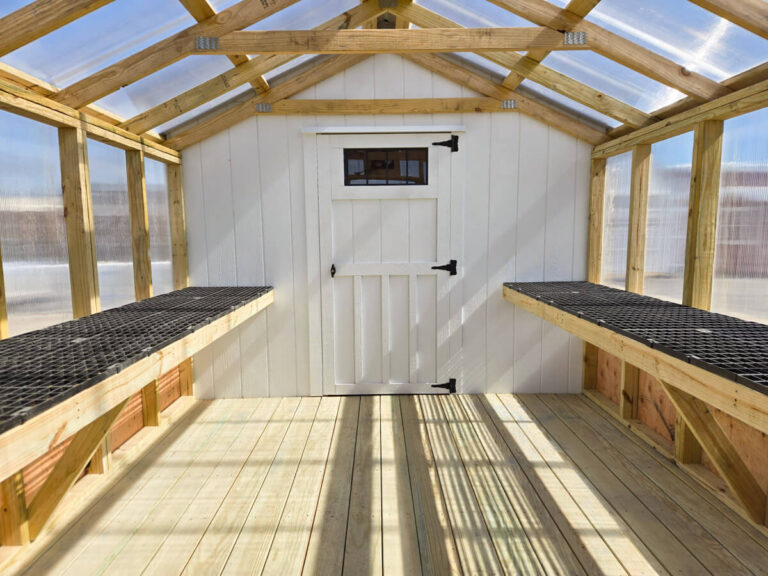 inside the greenhouse and facing the attached shed by MidAmerica Structures
