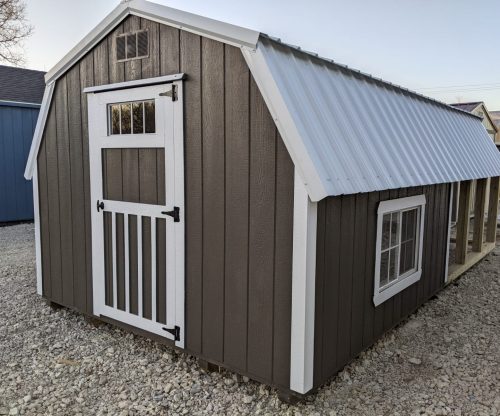 Chicken Coop with charcoal walls and white roof